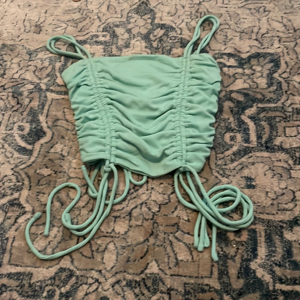 A teal colored top